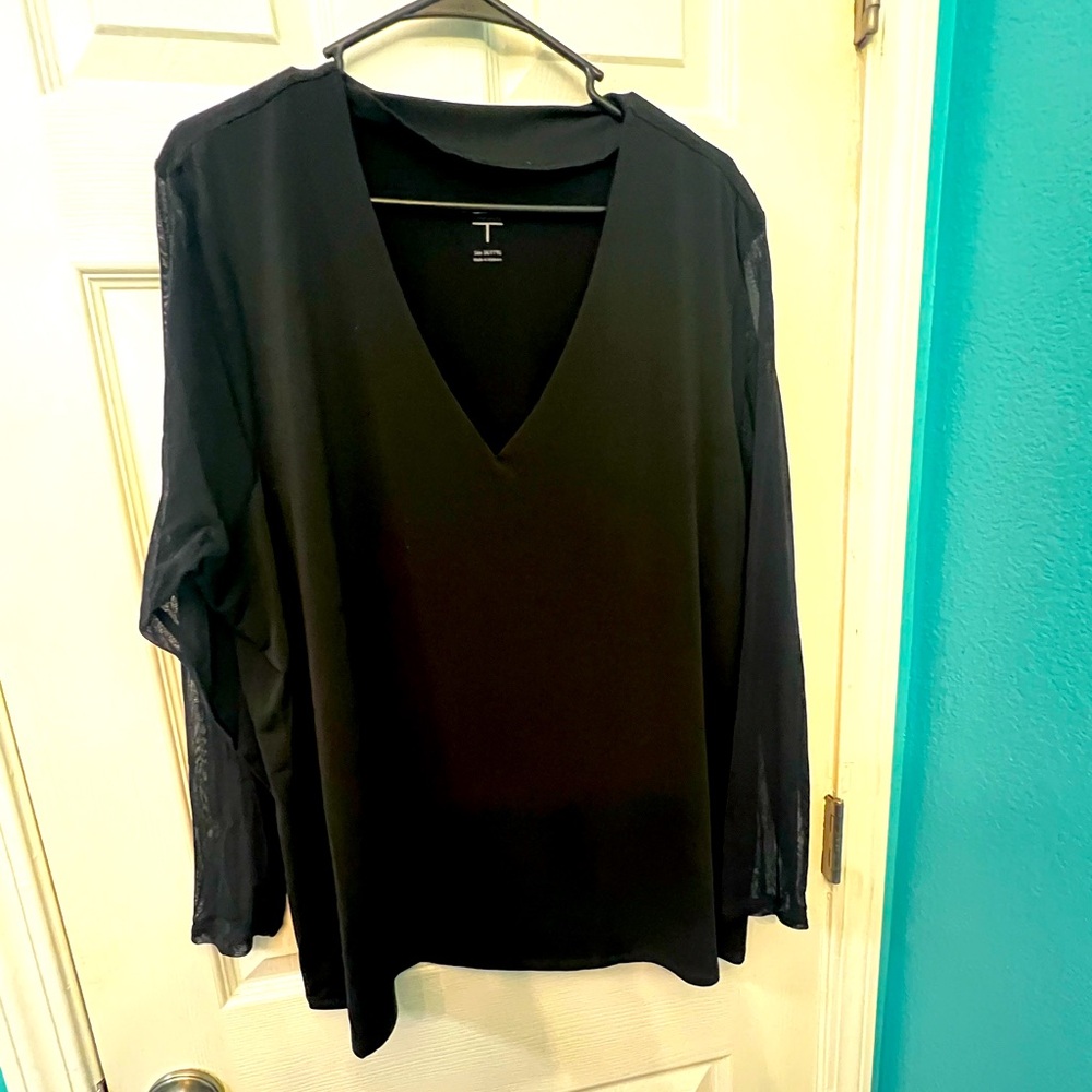 Black Top with shear long sleeves.